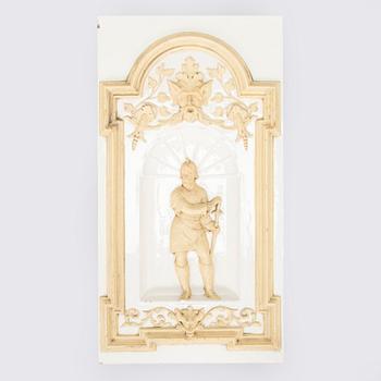 Reliefi / koriste-elementti kakluuniin Wilhelm Andstén, Helsinki, 1800-luvun loppu.