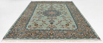 A Keshan carpet, signed, c. 376 x 270 cm.