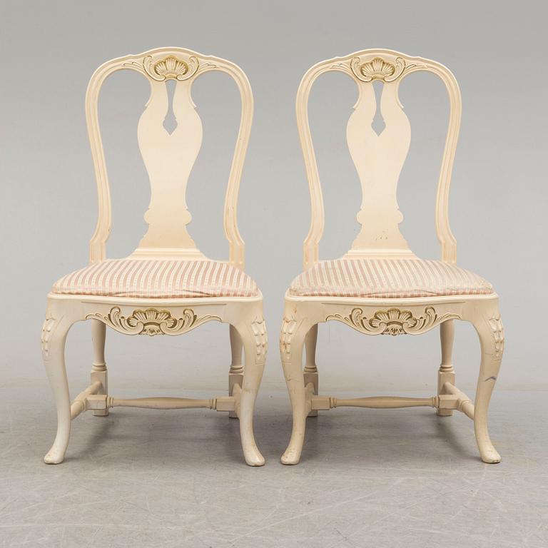 A set of eight mid 20th century rococo style chairs.