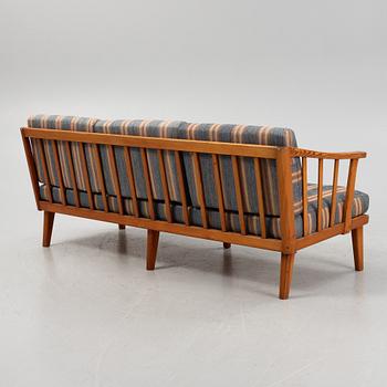 Carl Malmsten, a 'Visningsö' pina sofa.