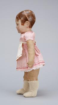 A 1930s century doll, resembling Käthe Kruse.