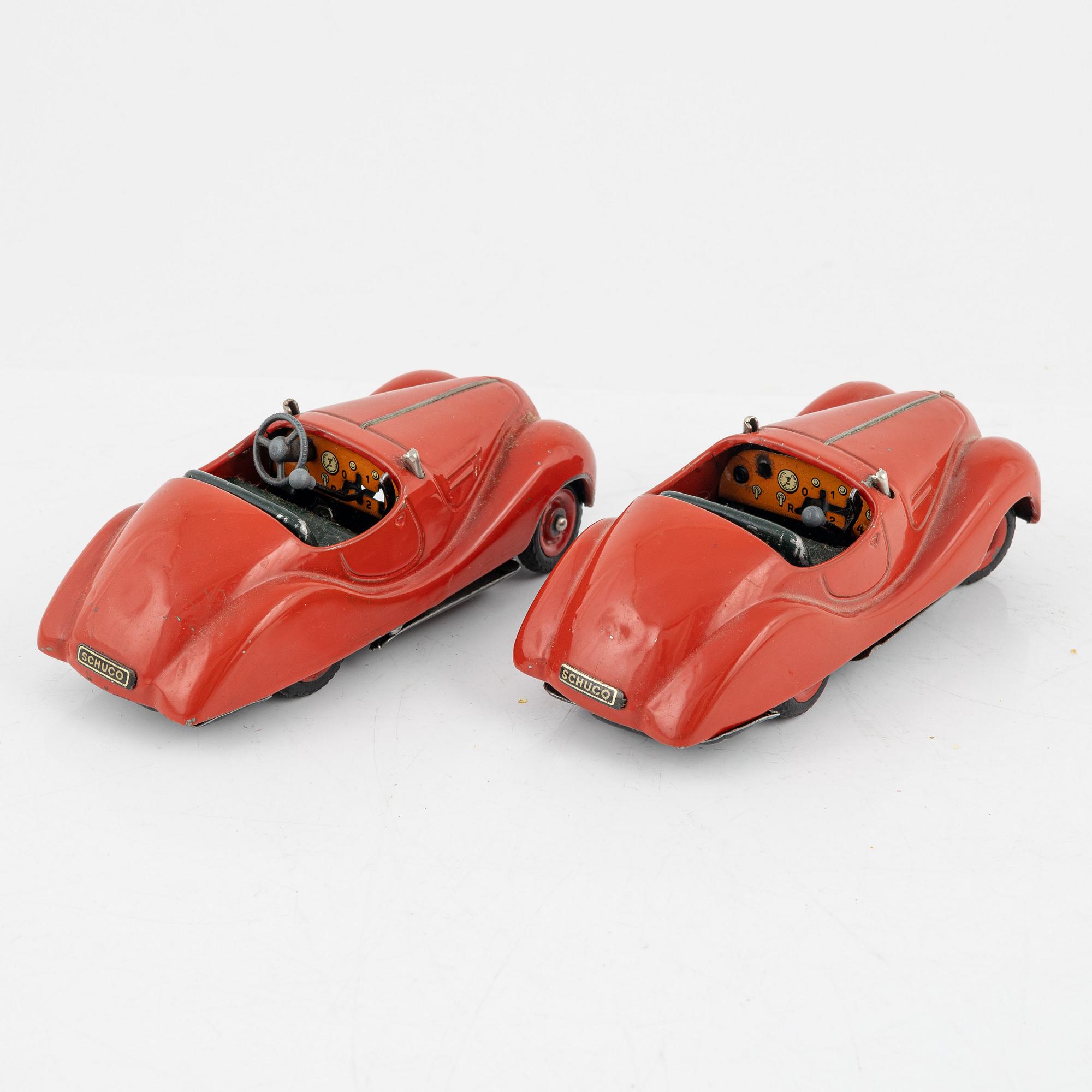 A set of five toy cars, mostly Schuco, Germany.
