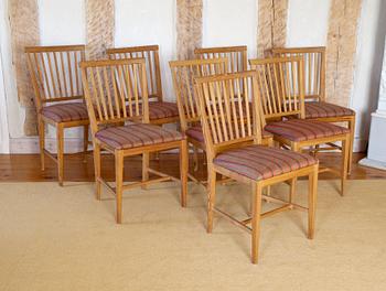 175. A SET OF EIGHT PINE CHAIRS,