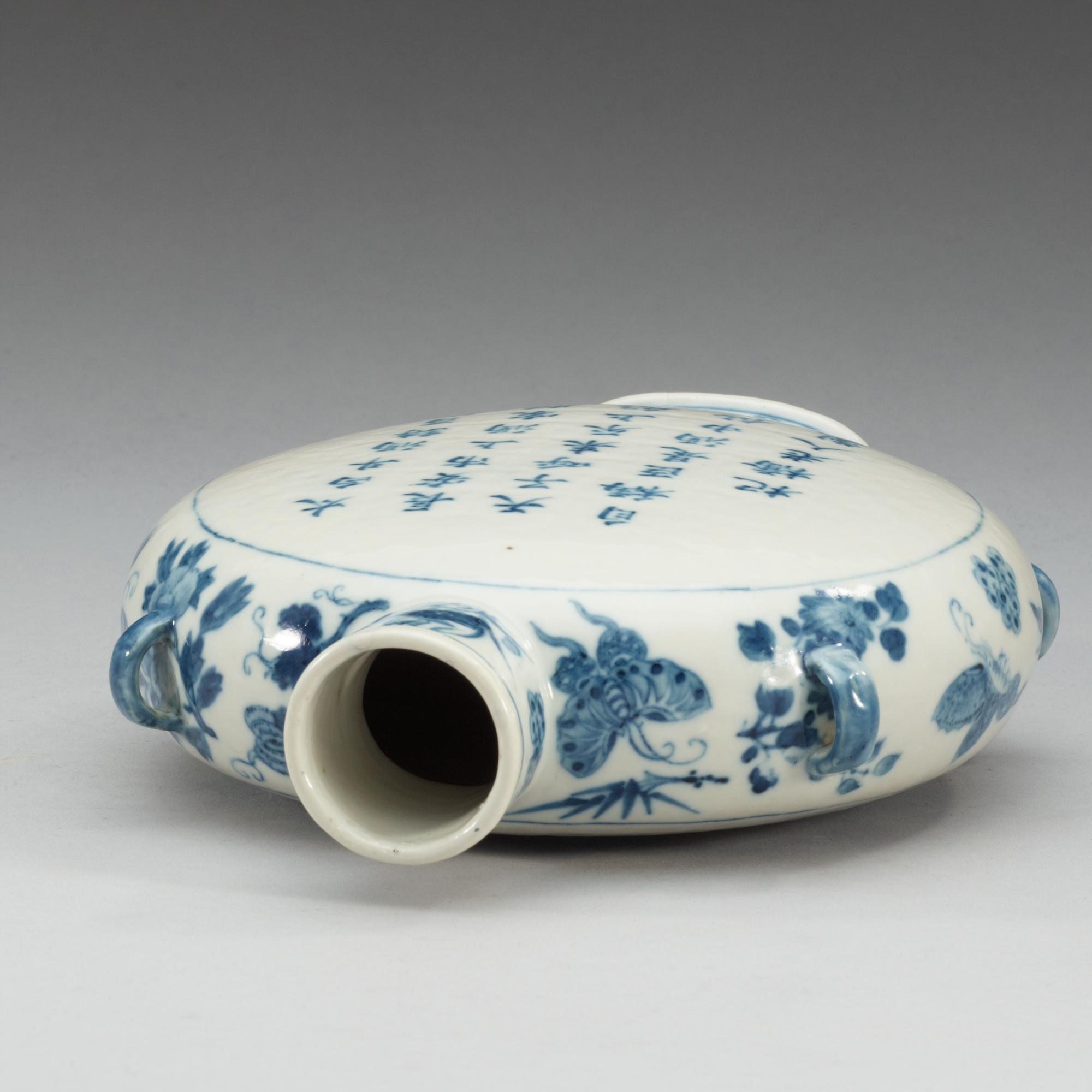 A blue and white moon flask, with a landscape and poem, Qing dynasty, 19th Century.