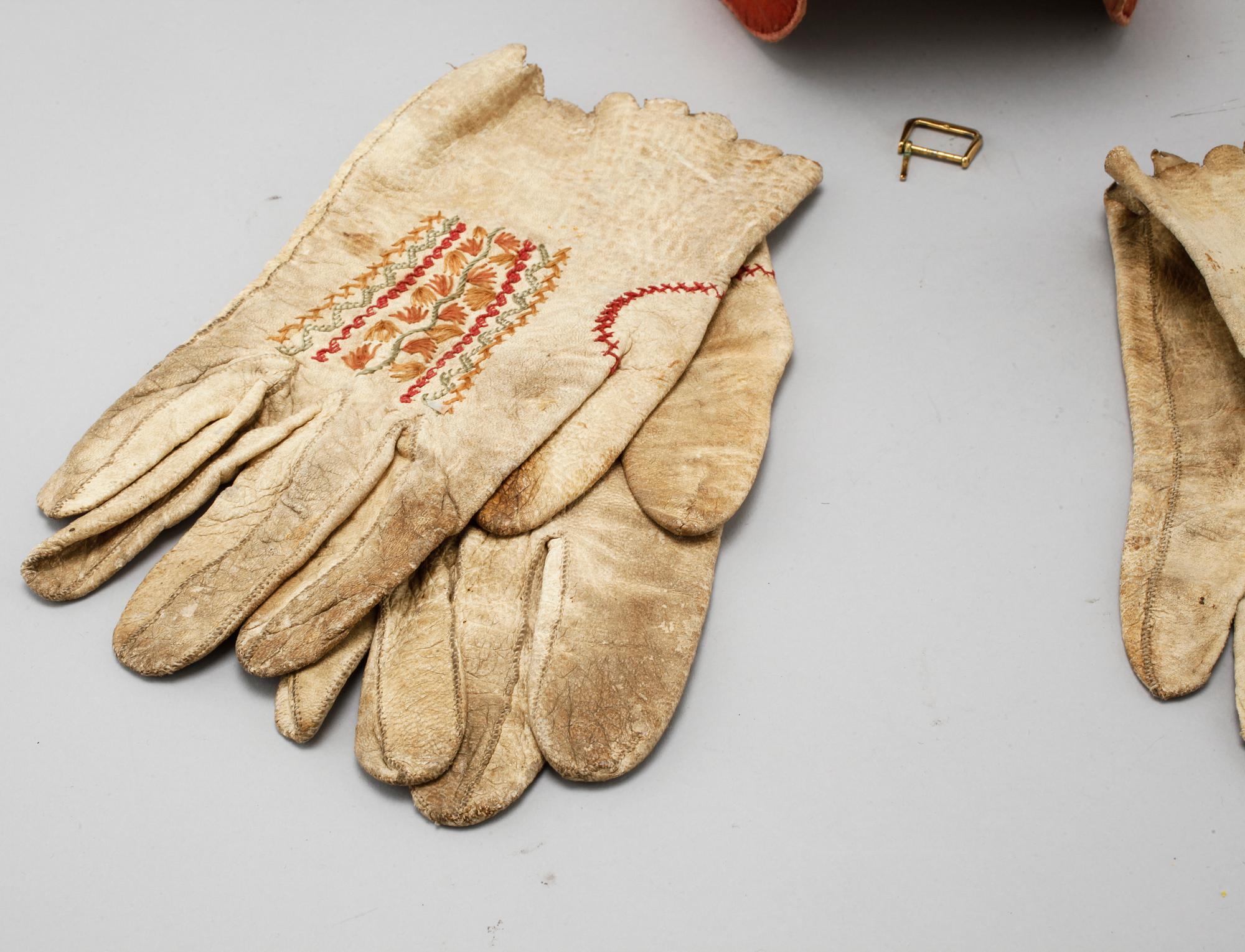 A bonnet and two pair of gloves from the second half of the 19th century.