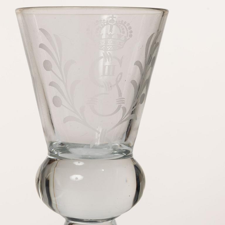 A set of 12 schnaps glasses by Reijmyre Glassworks with king Gustav III emblem.