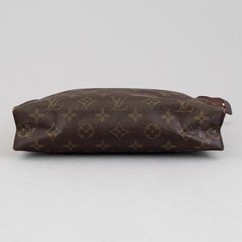 LOUIS VUITTON, a monogram canvas make up bag.