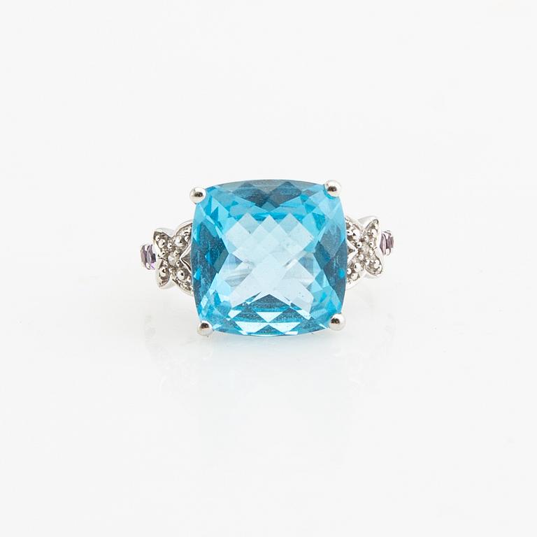 Ring, 14K gold with topaz, diamonds, and purple garnets.