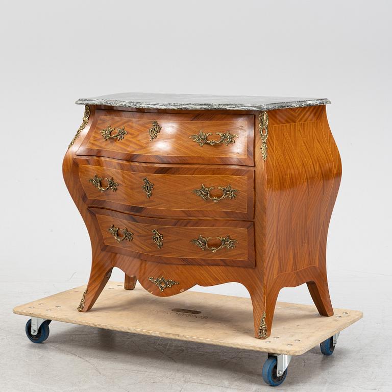 A rococo-style chest of drawers, early 20th century.