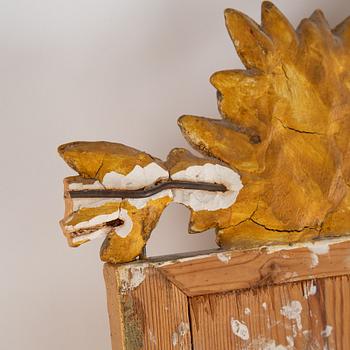 A mirror and console table from around the year 1900.