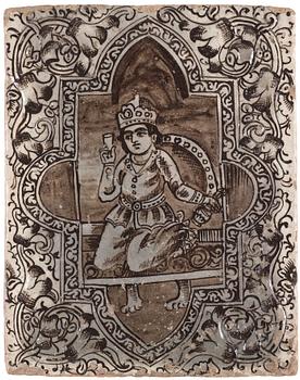 243. A Qajar moulded figural pottery tile, ca 45 x 35 cm.