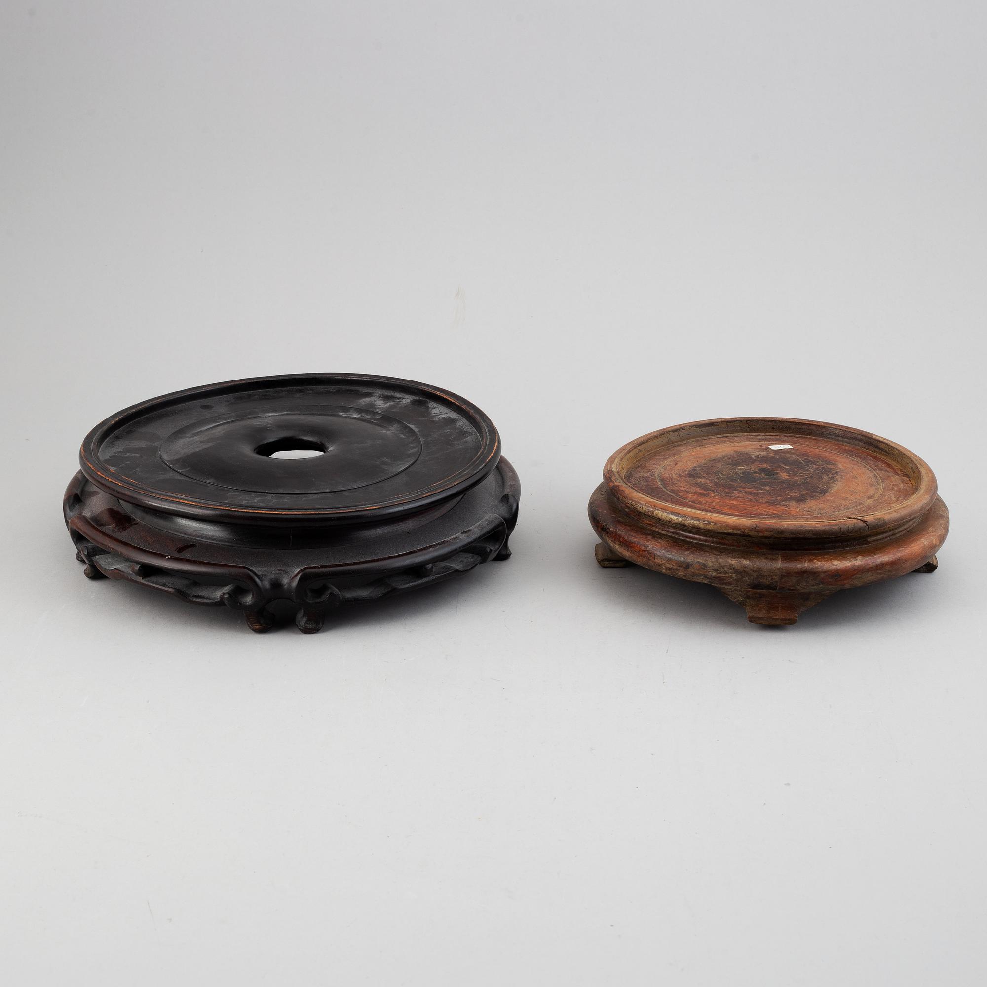 19 Chinese wooden stands, 20th century.