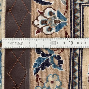 A part silk Nain 9la carpet, c. 300 x 195 cm.