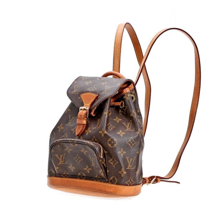 A monogram canvas back-pack by Louis Vuitton.