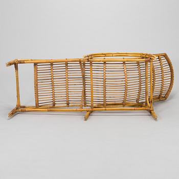 A mid-20th century rattan lounge chair.