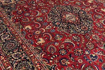 A CARPET, Mashad, signed, ca 385 x 293 cm.
