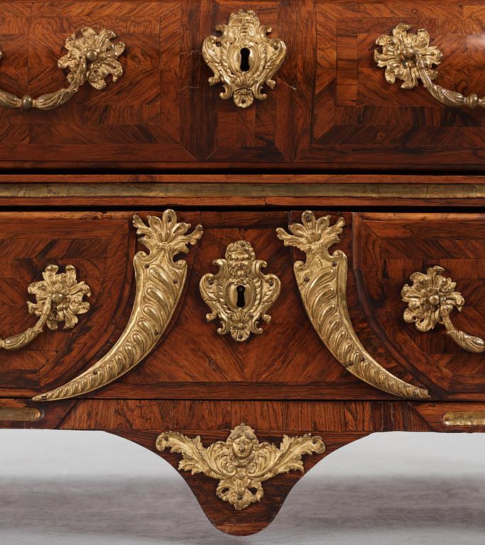 A Swedish early rococo parquetry, ormolu-mounted and marble commode, presumably by S. Pasch or J. Wulf , ca. 1740.