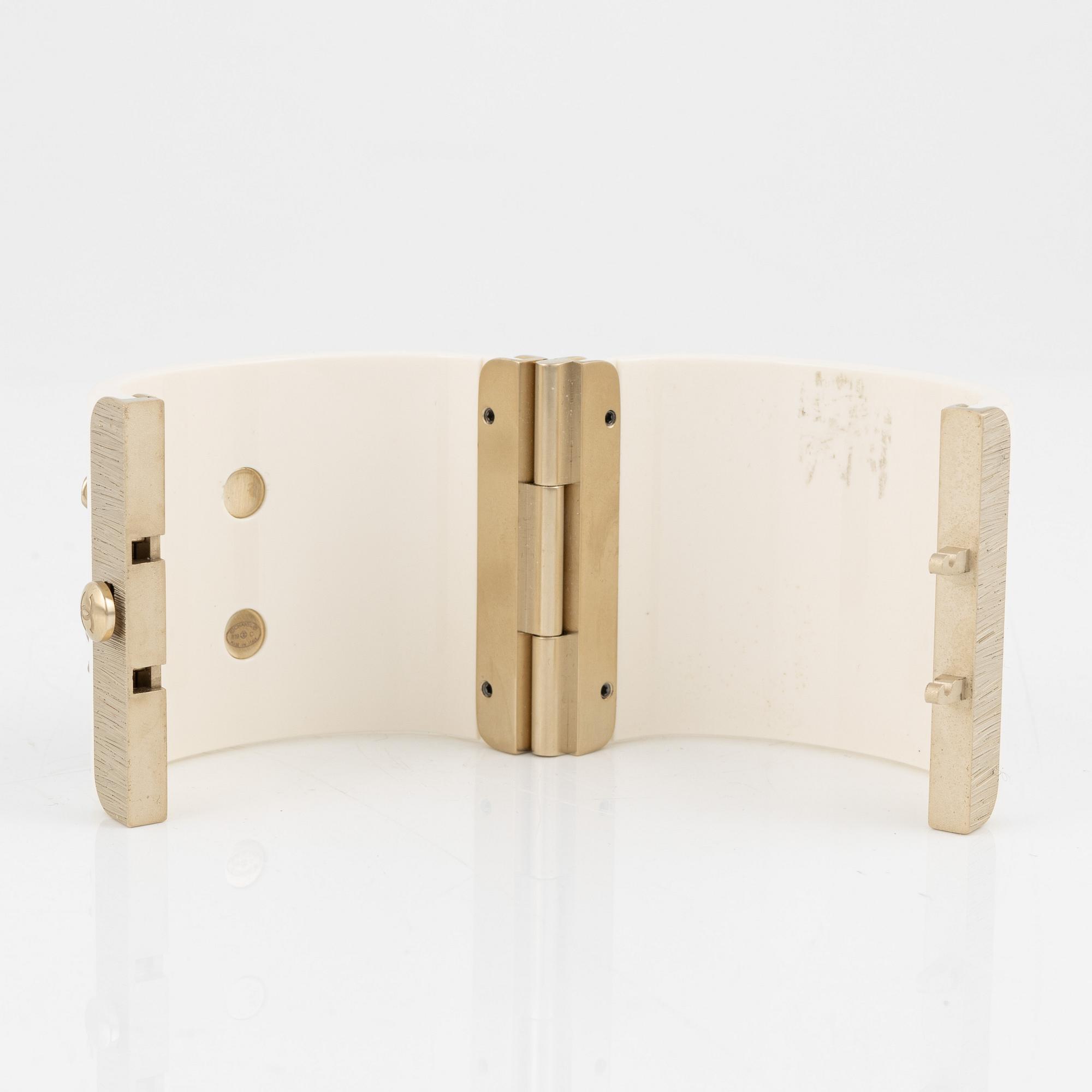 Chanel, a white acrylic bracelet with pearls, 2019.
