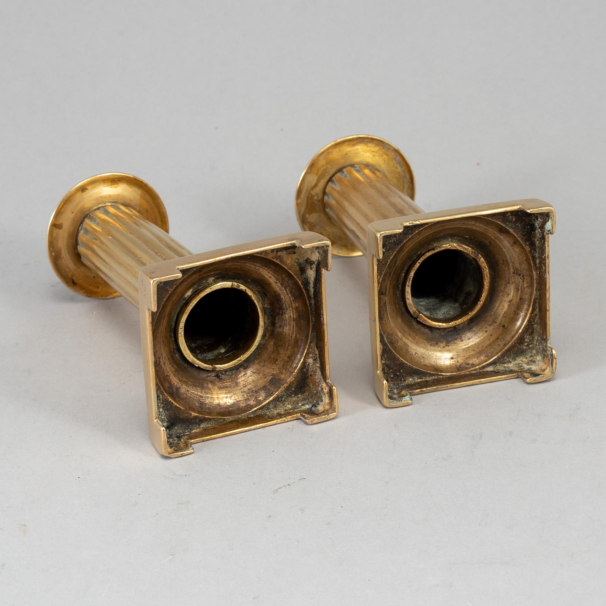 A pair of Louis Seize bronze candlesticks, late 18th century.