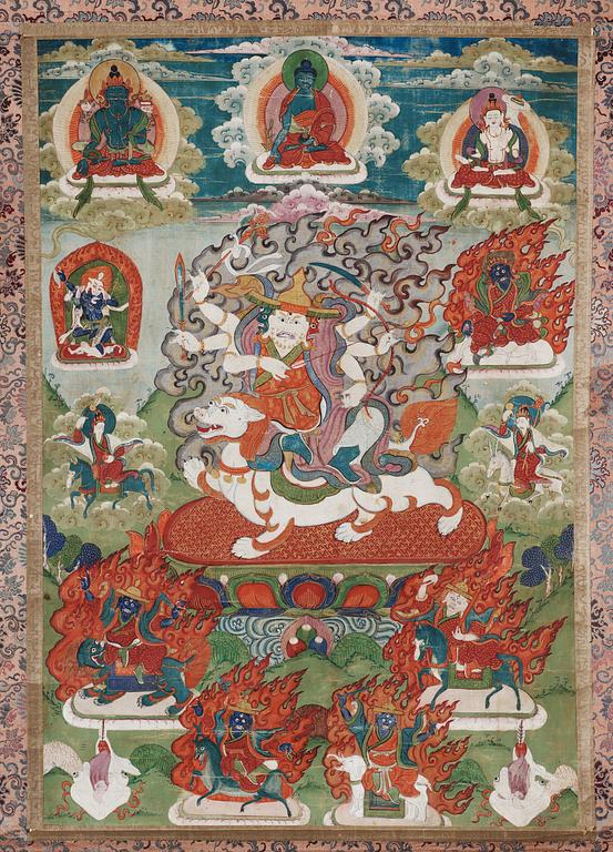 A Tibetan or Mongolian thangka of Dorje Legpa on lion, surrounded by a Buddhist pantheon, presumably 19th Century.