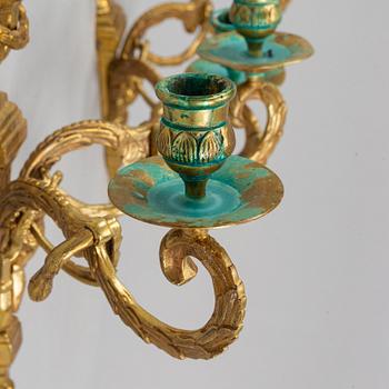 A pair of wall sconces, Louis XVI style, early 20th century.