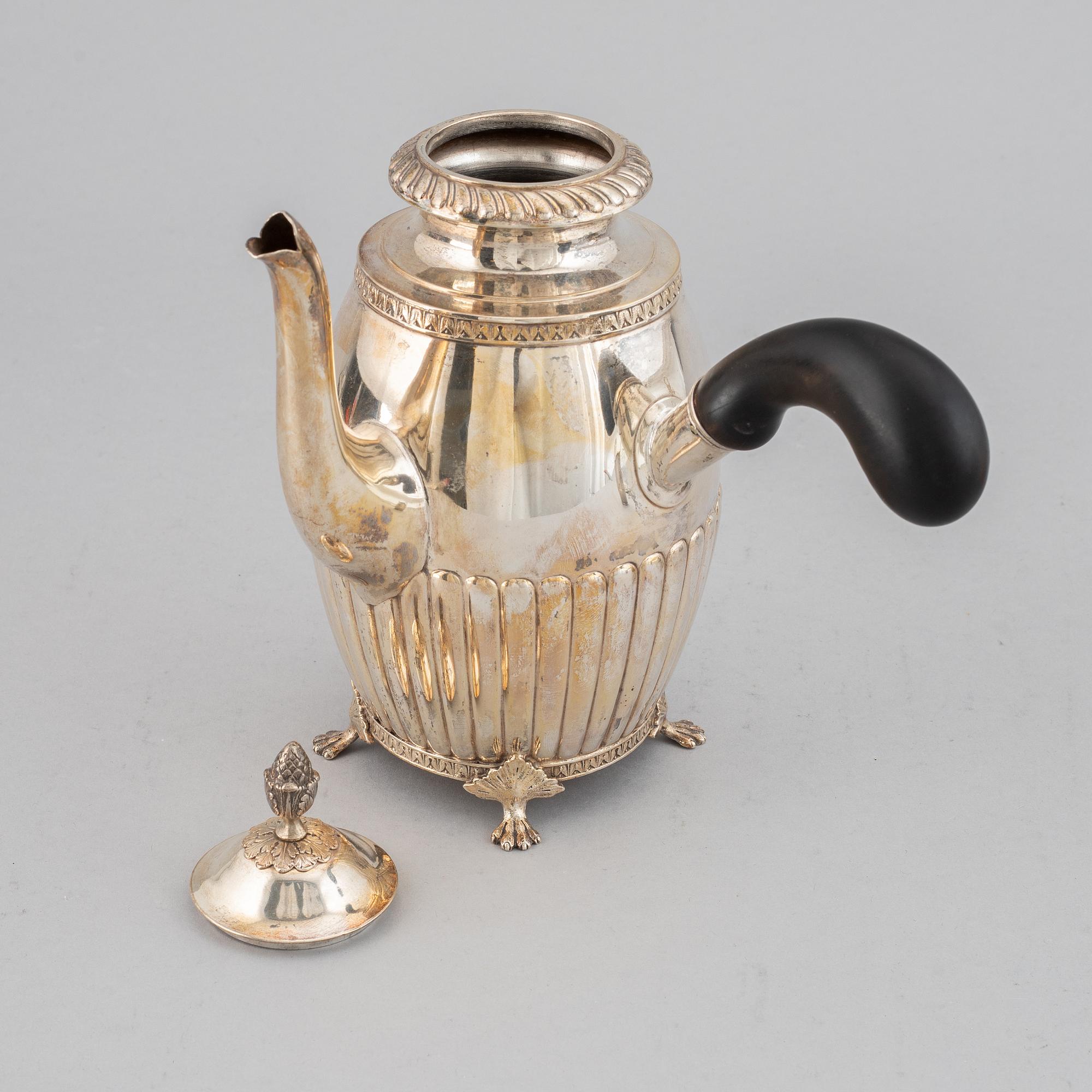 A swedish silver coffee pot, creamer and sugar box, J.E. Torsk, Stockholm 1900.