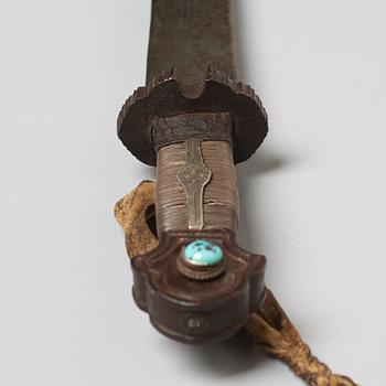 A Tibetan classig long broad blade sword with scabbard, 19th Century.
