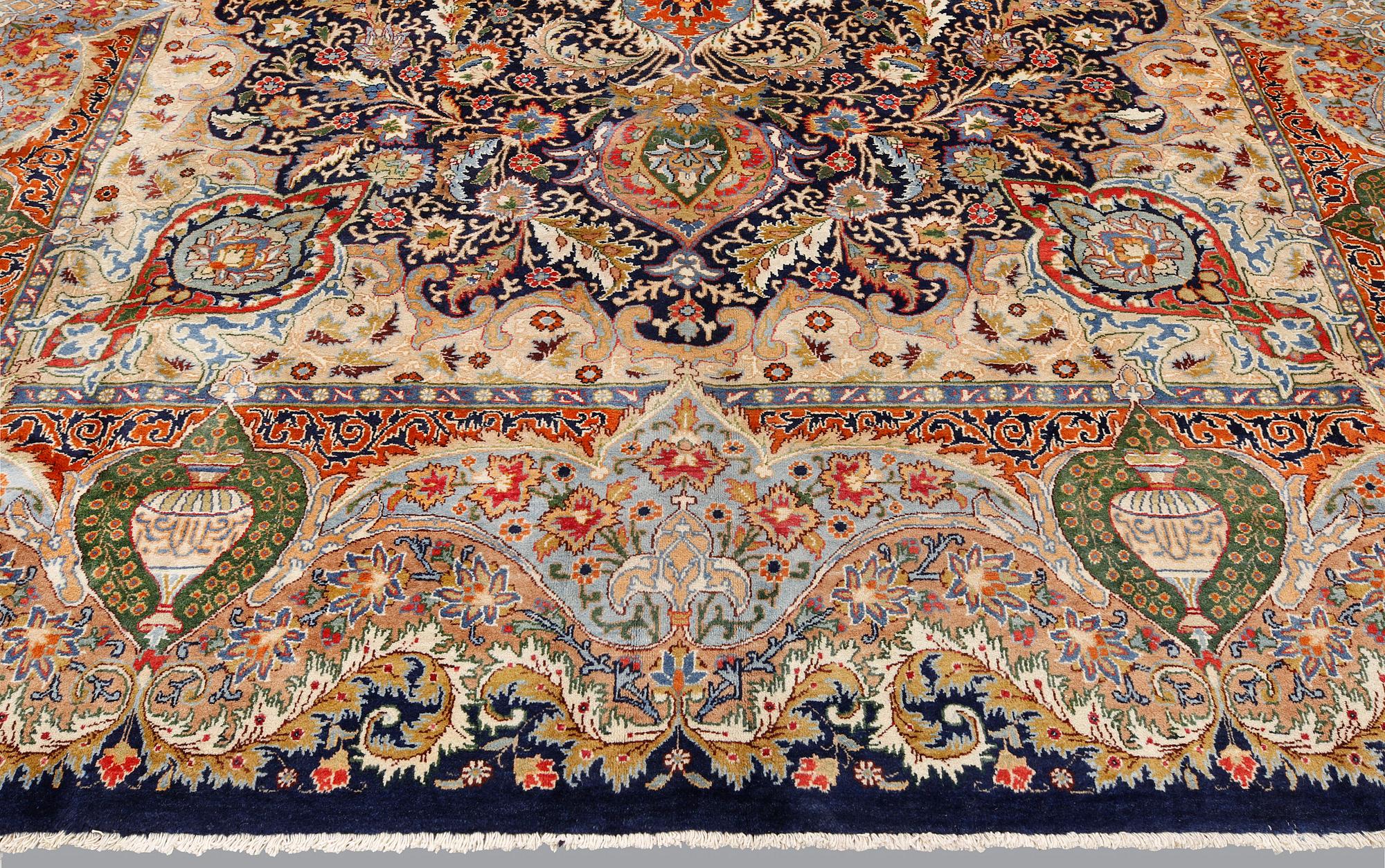 A figural Kashmar carpet, 391 x 306 cm.