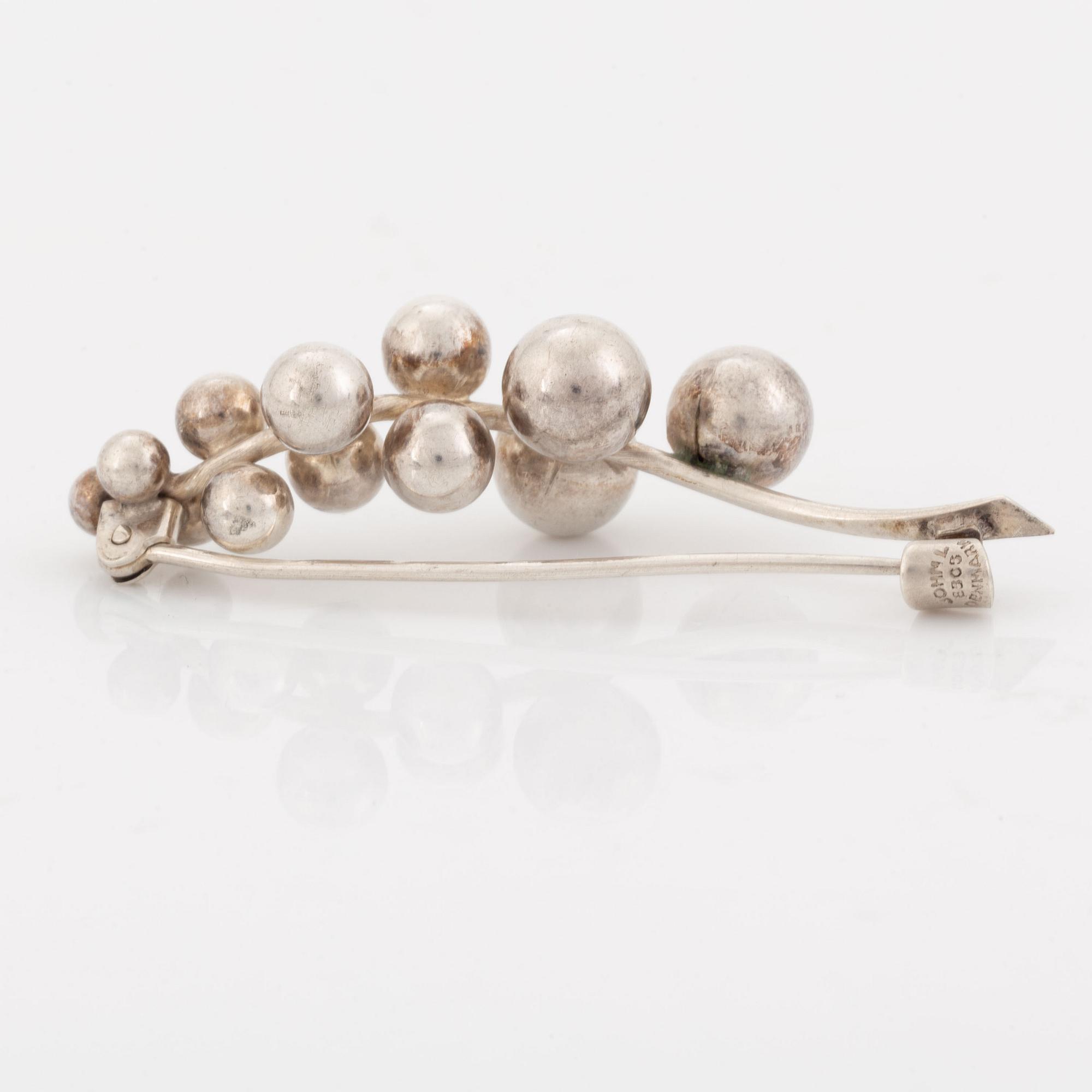 John L Denmark, brooch, silver.