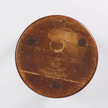 Axel Einar Hjorth, a stained pine "Skoga" stool, Nordiska Kompaniet, Sweden, 1930s.