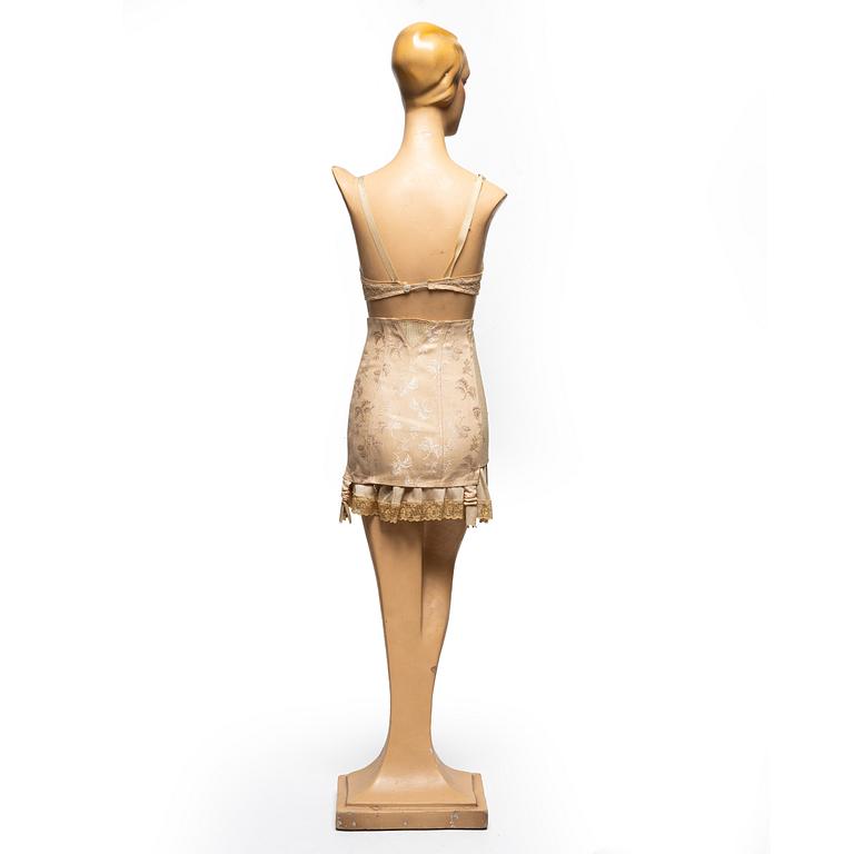 A 1930's storefront mannequin.