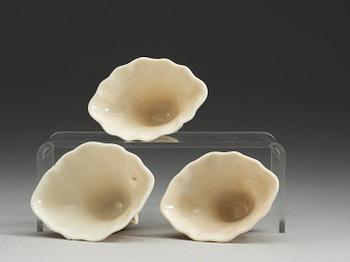 A set of three blanc de chine libation cups, Qing dynasty.