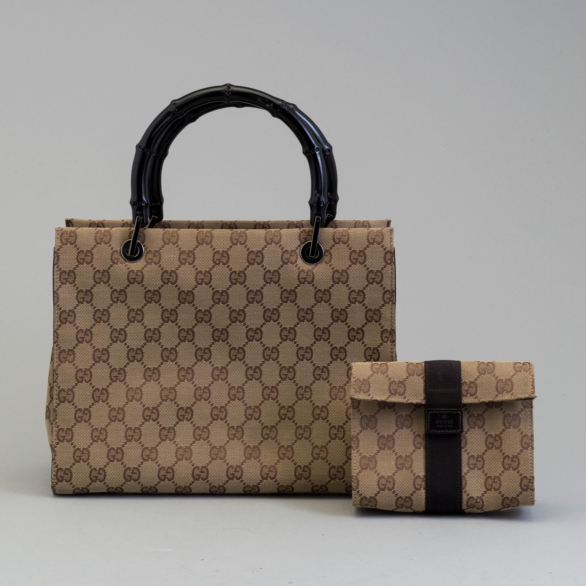 GUCCI, a monogram fabric hand bag and beauty bag.