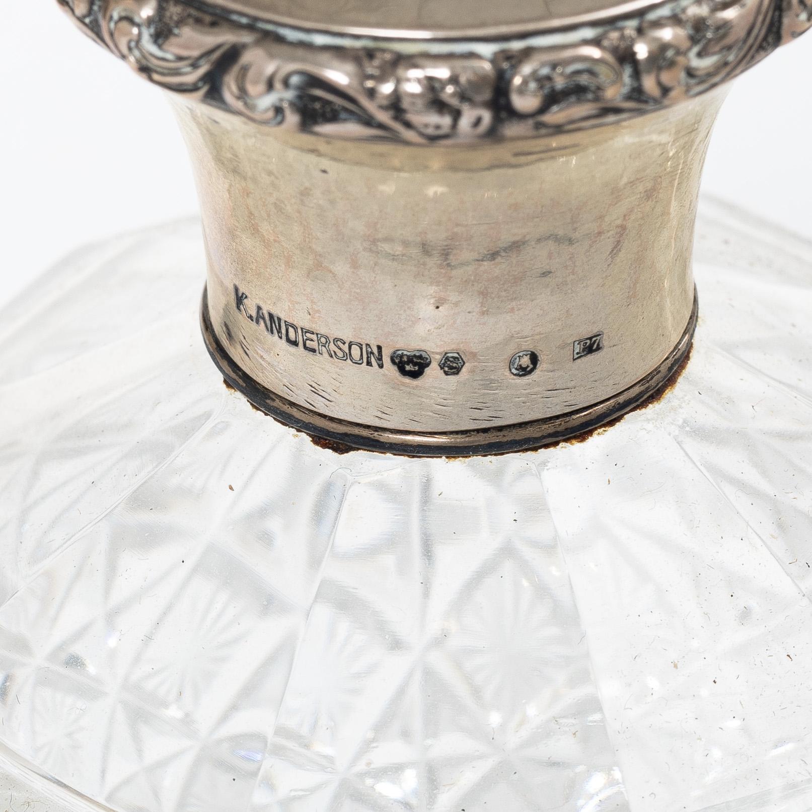 A K.Andersson silver and cut glass 'toilette set', monogrammed 'PG'. (11 pieces).