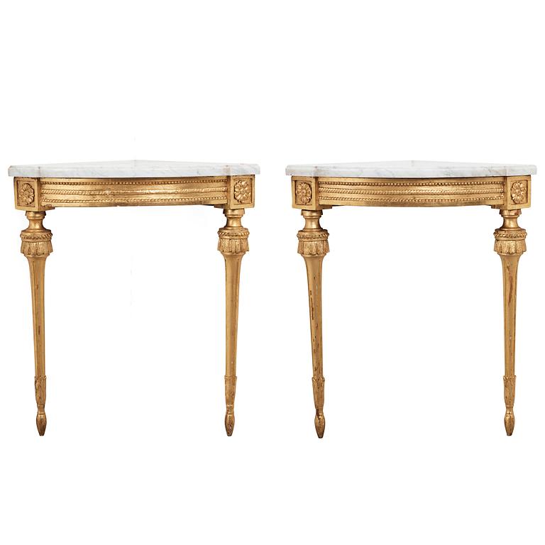 A pair of Gustavian late 18th century corner console tables.