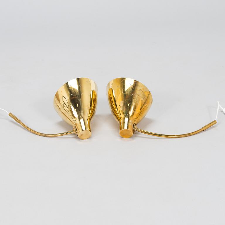 Lisa Johansson-Pape, a pair of mid-20th century '3055' wall lights for Stockmann Orno. Finland.