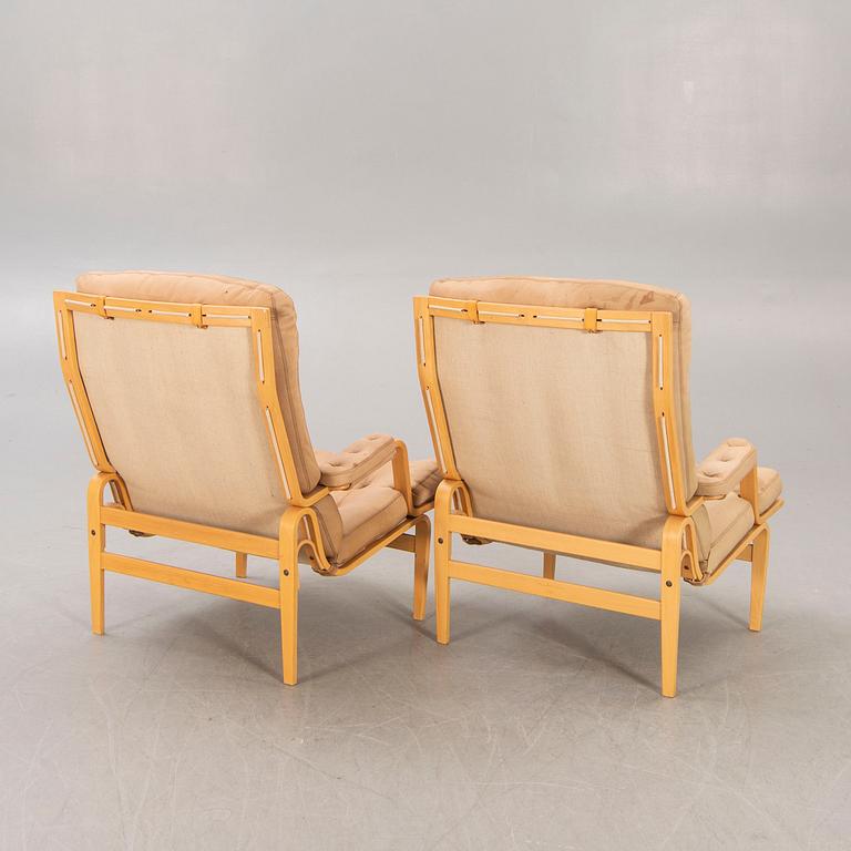 A pair of Bruno Mathsson Ingrid leather armchairs later part of the 20th century.