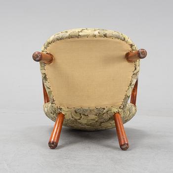 Arnold Madsen "Clam chair/ Muslinge fåtölj", sannolikt Madsen & Schubell, Danmark, 1940-50-tal.