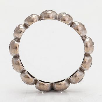 An 18K white gold eternity ring, with brilliant-cut diamonds totalling approximately 0.39 ct.