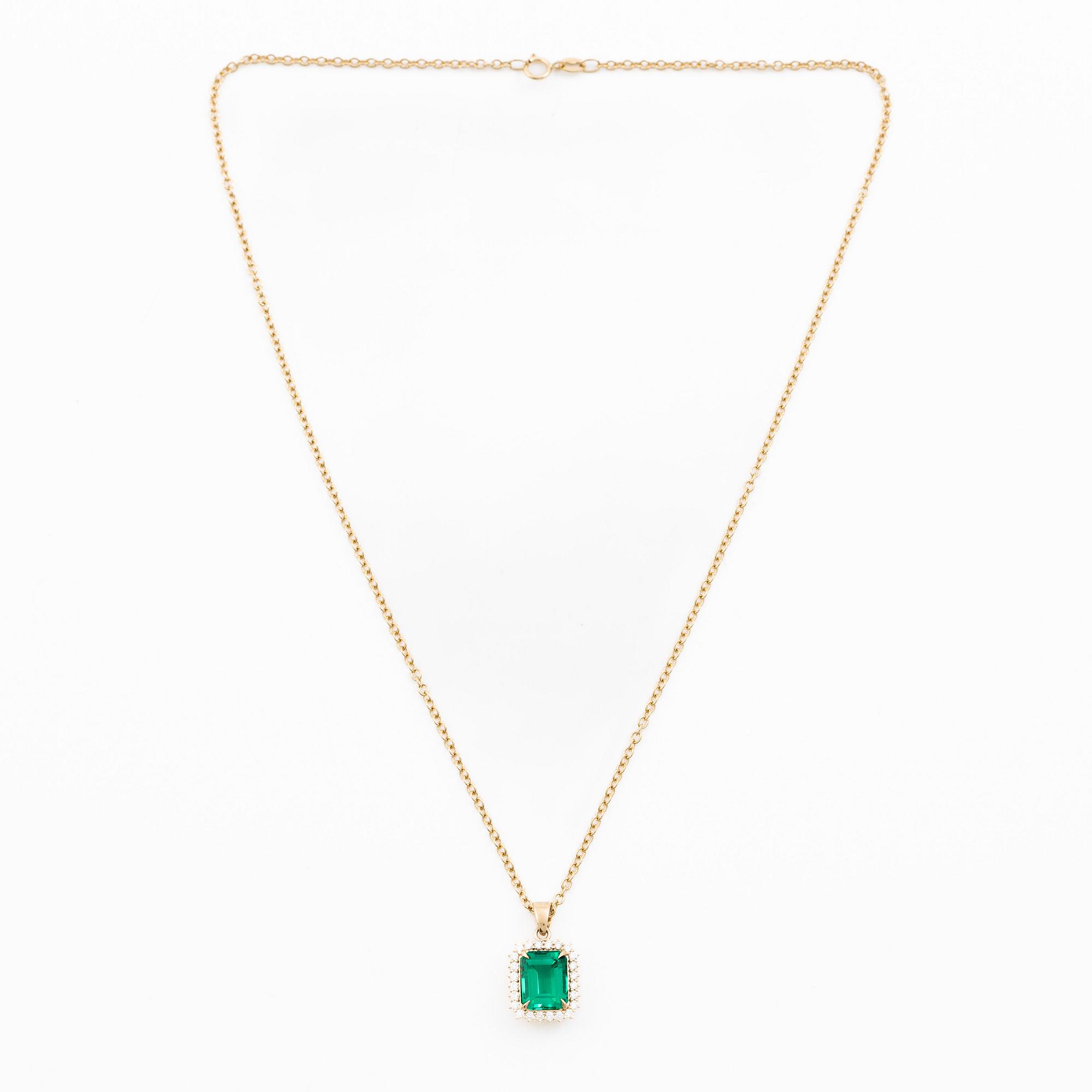Necklace 18K gold with synthetic emerald and brilliant-cut diamonds.