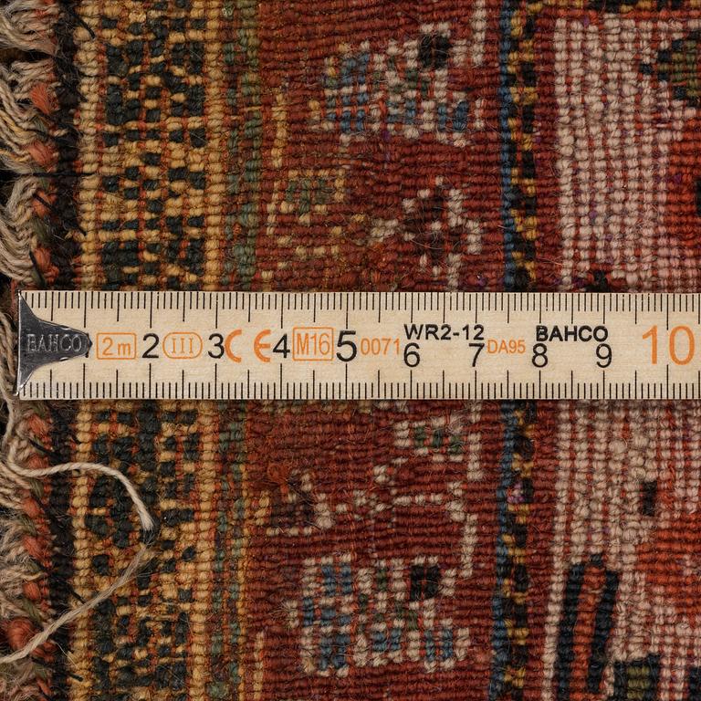 An antique Qashqai rug, southeastern Iran, c 204 x 102 cm.