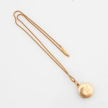 Halsband 18K guld med berlock.