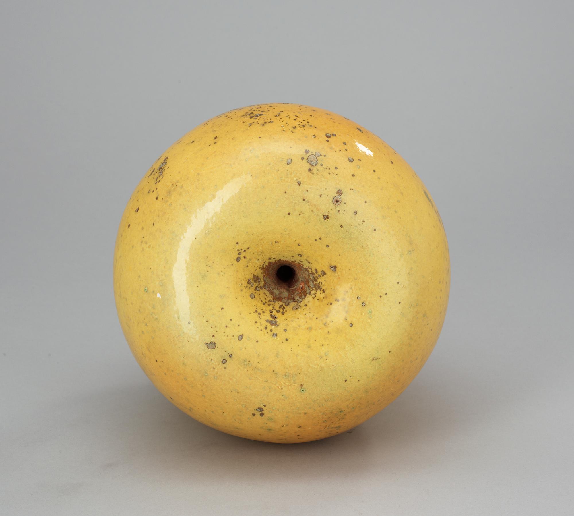 A Hans Hedberg faience apple, Biot, France.