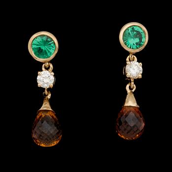 EARRINGS, yellow sapphires, 3.30 cts, tsavorites and brilliant cut diamonds, tot. 0.20 cts.