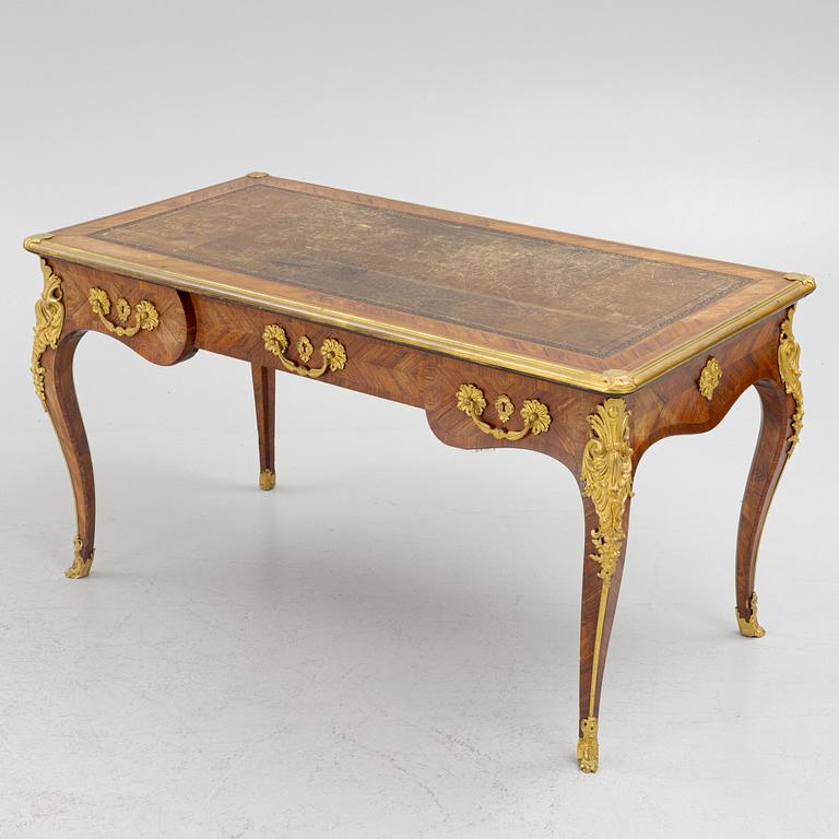 A French Napoleon III Louis XV-style parquetry and gilt bronze-mounted desk, second half of the 19th century.