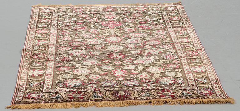 A rug, an antique silk metal brocaded Kashan, probably around 1910, ca 200-202,5 x 129-131 cm.