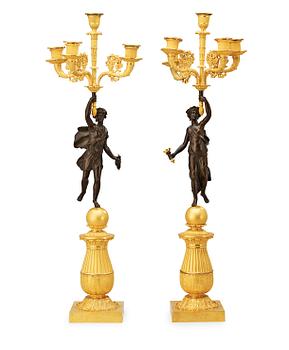 A pair of French Empire early 19th century five-light candelabra.