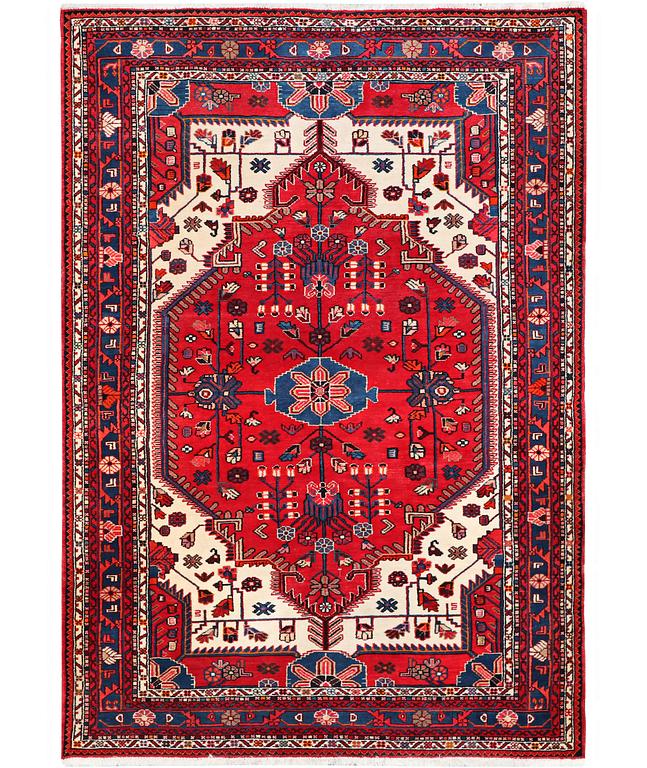 An oriental carpet, c. 230 x 151 cm.