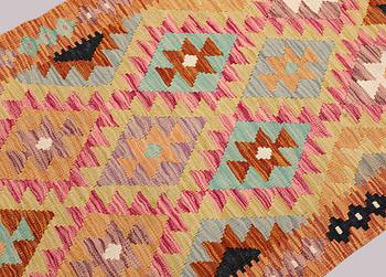 A Kilim runner, approx. 395 x 85 cm.