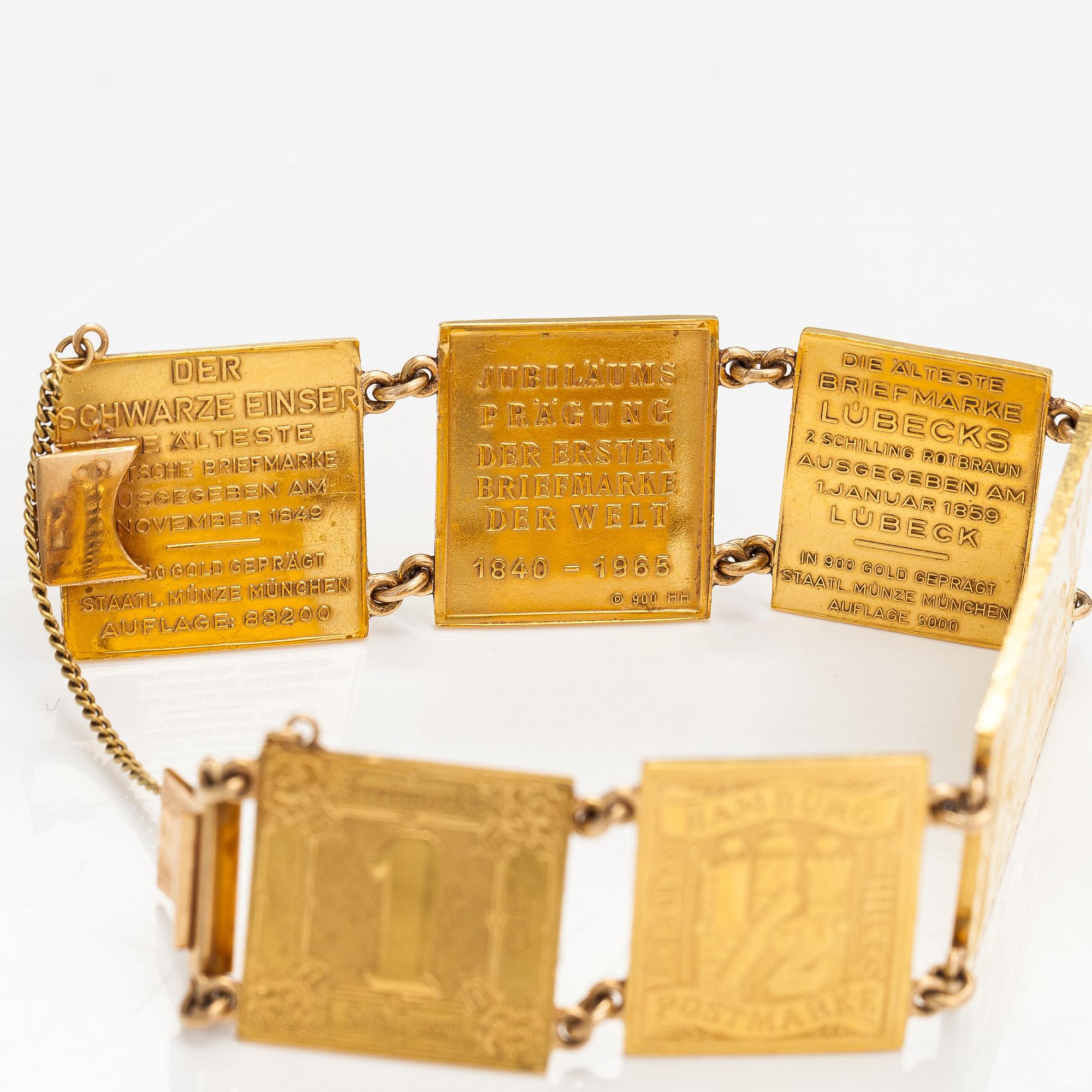 A bracelet with post stamps made of 900 gold..